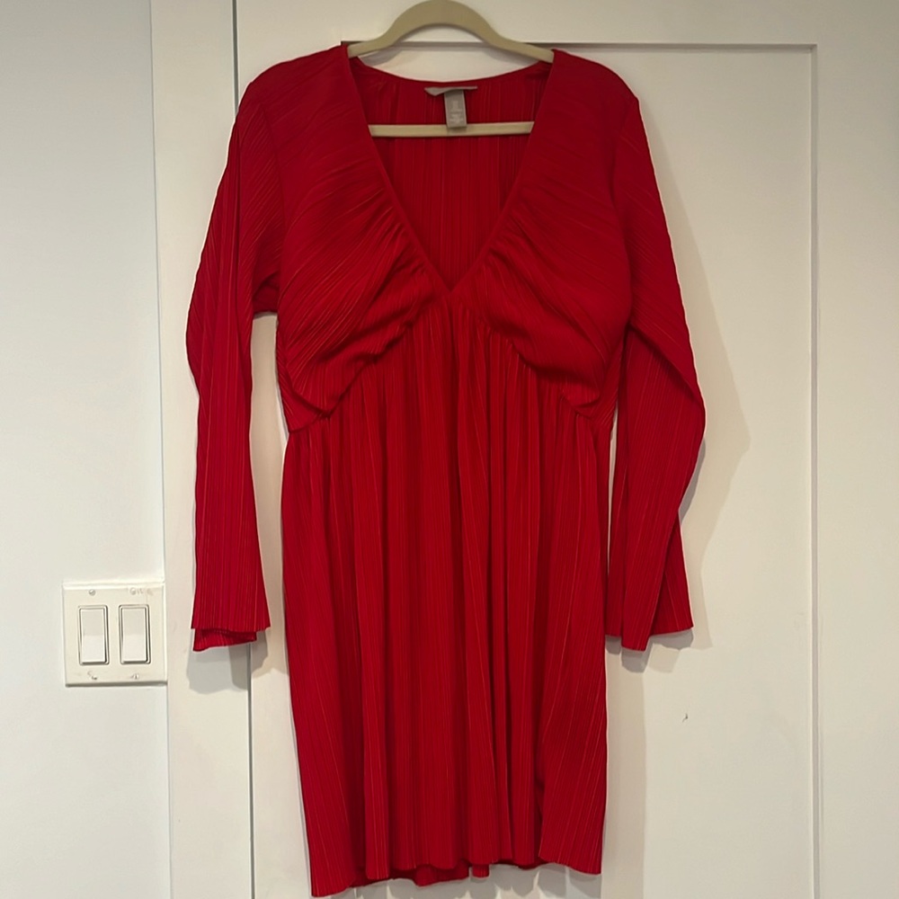 red deep v mini dress with bell sleeves